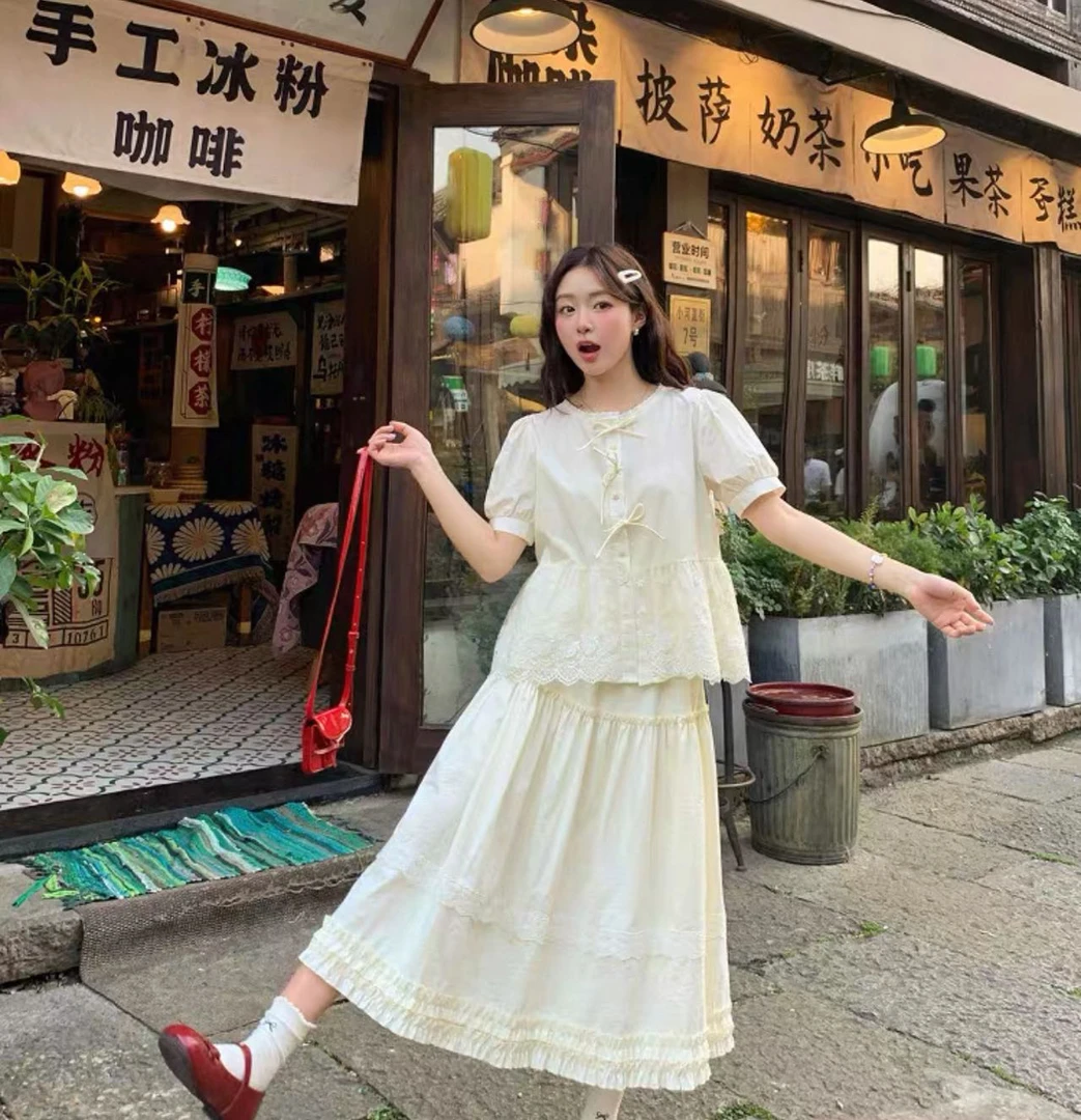 盐系圆领蝴蝶结泡泡袖衬衫温柔风蕾丝拼接韩版宽松大码上衣女夏季