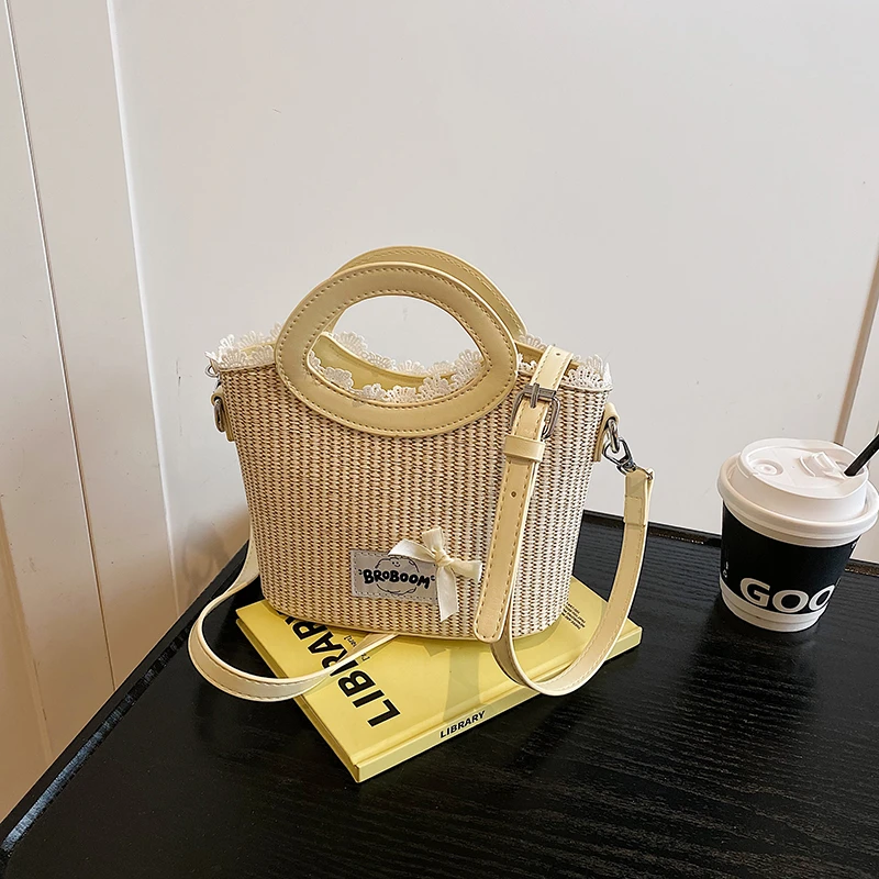 编织菜篮子包女夏季新款高级感单肩包小众设计花边斜挎水桶包3811