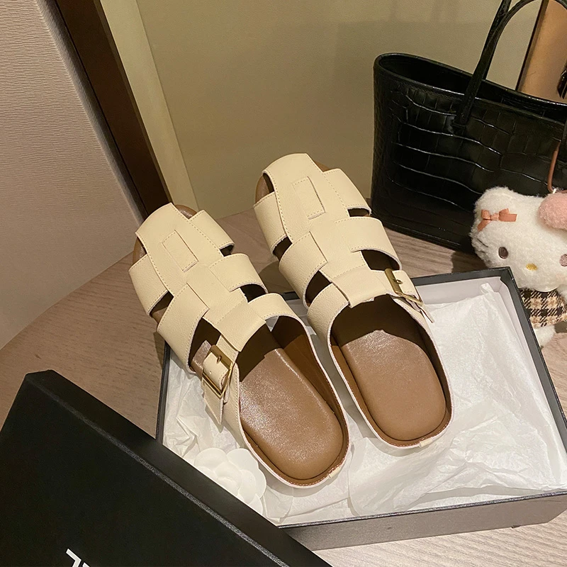 诗宝斐尔~编织镂空包头半拖鞋女夏外穿真皮平底罗马凉鞋猪笼凉拖