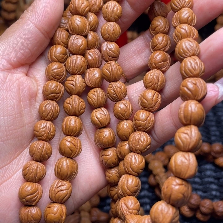 昵***置木质类龙纹桃枭挂件