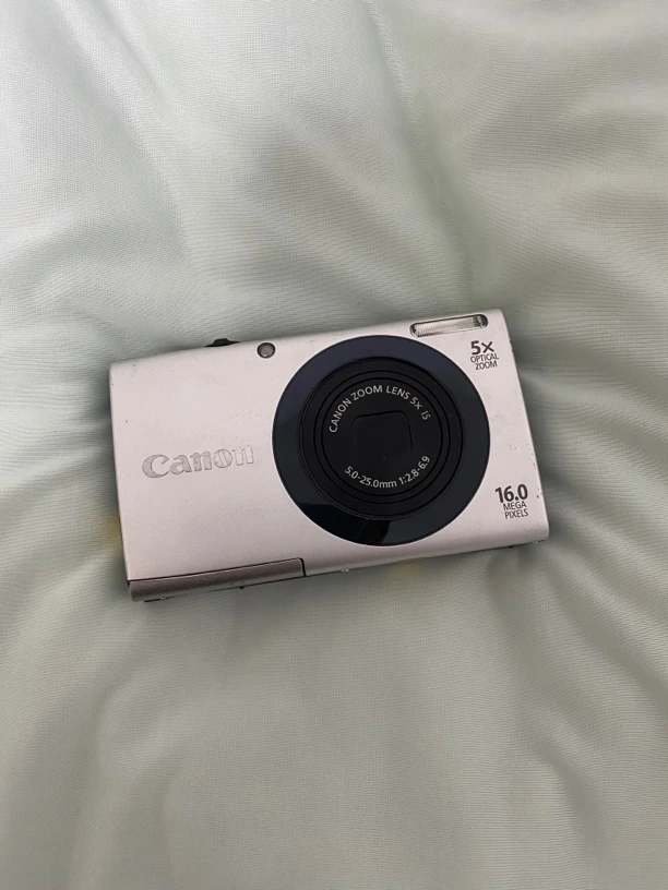 9新 Canon/佳能 a3400银色1600w像素ccd数码相机