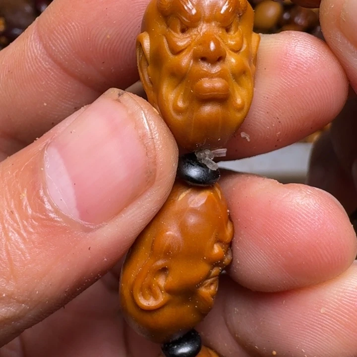 橄榄核把件你的电话