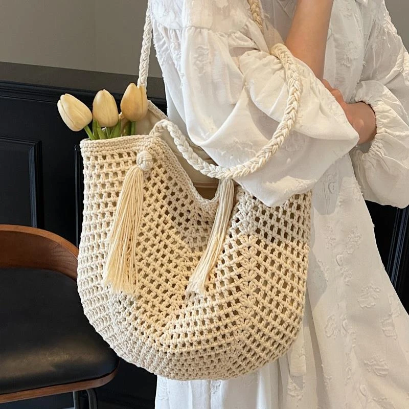 2025新款镂空海边旅行沙滩草编包编织包包女2025新款大容量托特包