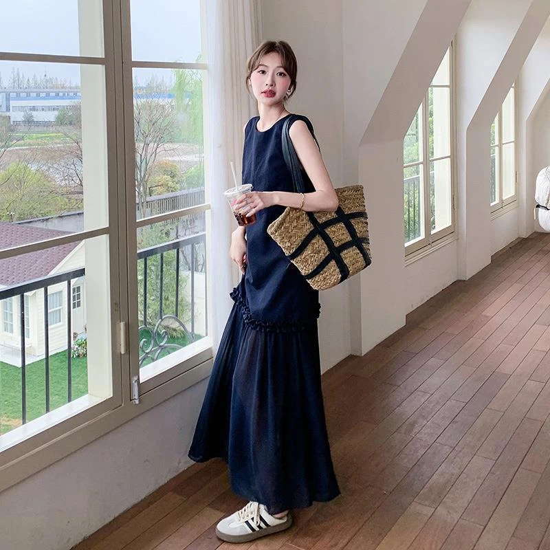 深蓝色网纱拼接无袖连衣裙女2025夏新款法式轻熟风气质显瘦背心裙