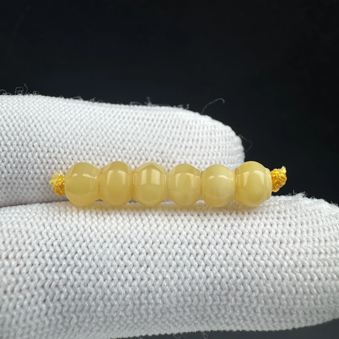K4131天然原矿蜜蜡 隔珠6.2mm支持复检假一罚十