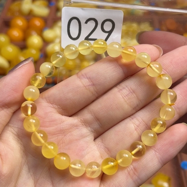 蜜蜡未镶嵌珠宝奇石微瑕放漏金绞蜜圆珠手串卡7+