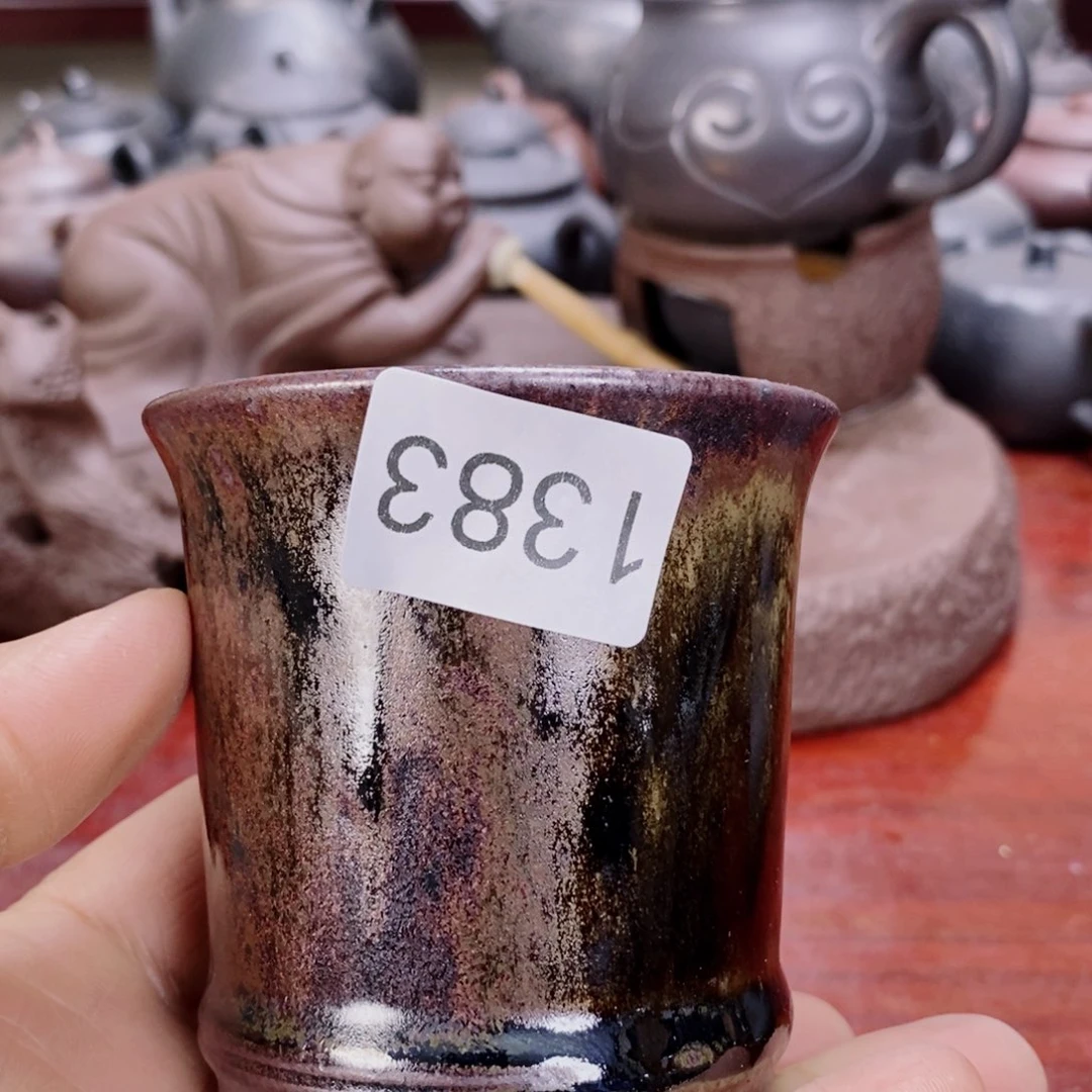 紫砂茶杯tyi o p 4689900