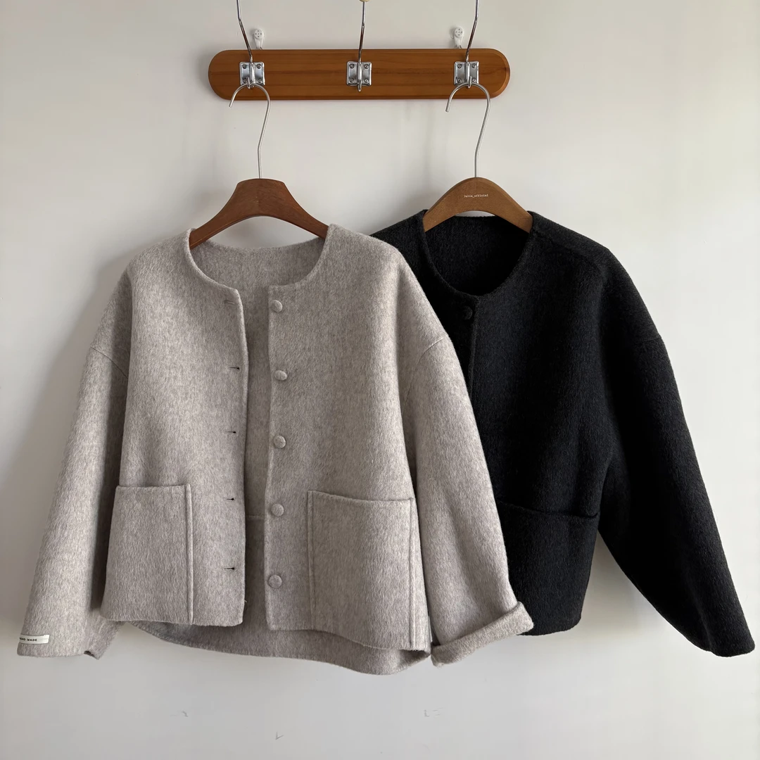 “西西里的傍晚”清冷感前口袋系扣短款大衣