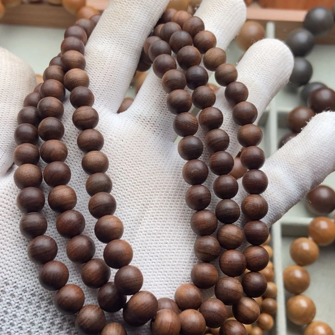 檀香木手串/手链是***奕0.8老山檀香黑肉沉奶香瑕疵念珠