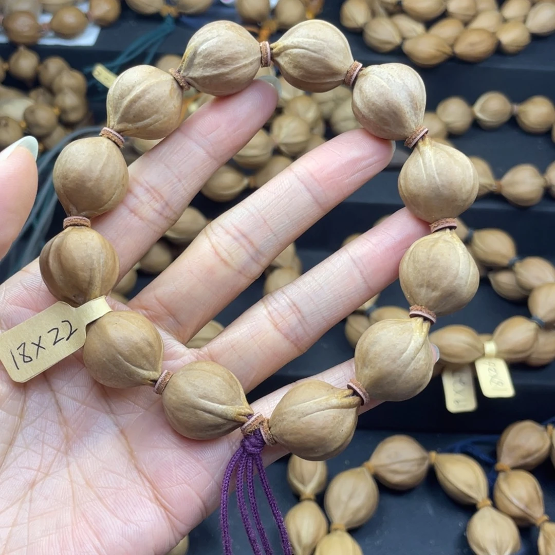 T***r001橄榄核三花18*22