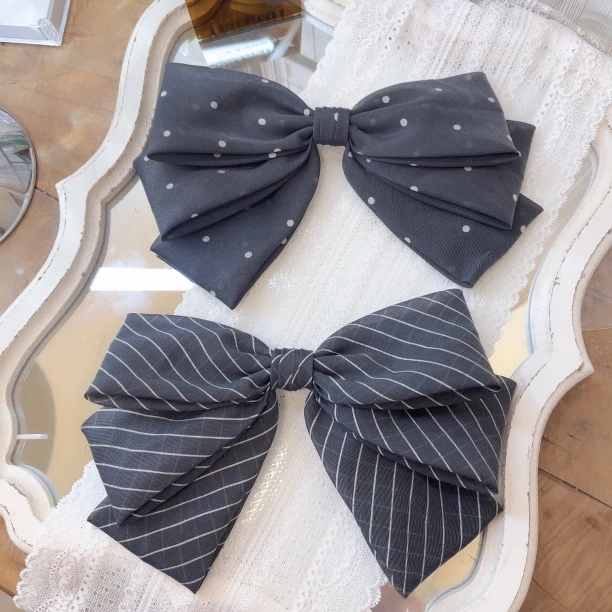 W828韩系氛围减龄百搭简约蝴蝶结设计弹簧夹