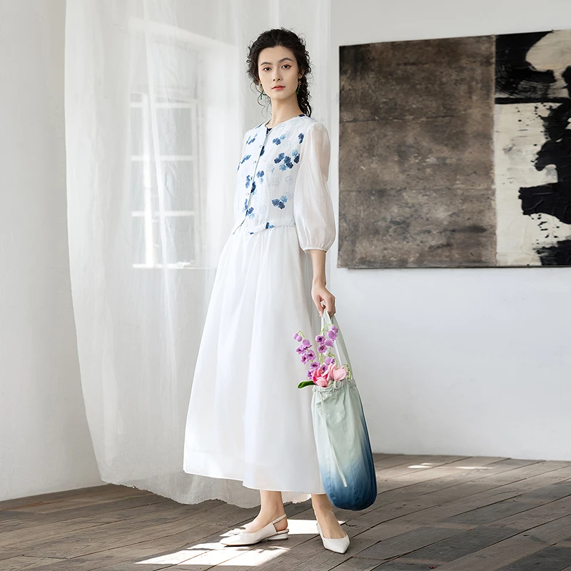 生活在左2025春季新品优雅印花修身显瘦连衣裙女日常1951204文艺.