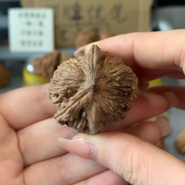 越***好文玩核桃吊坠异形单只，有瑕疵