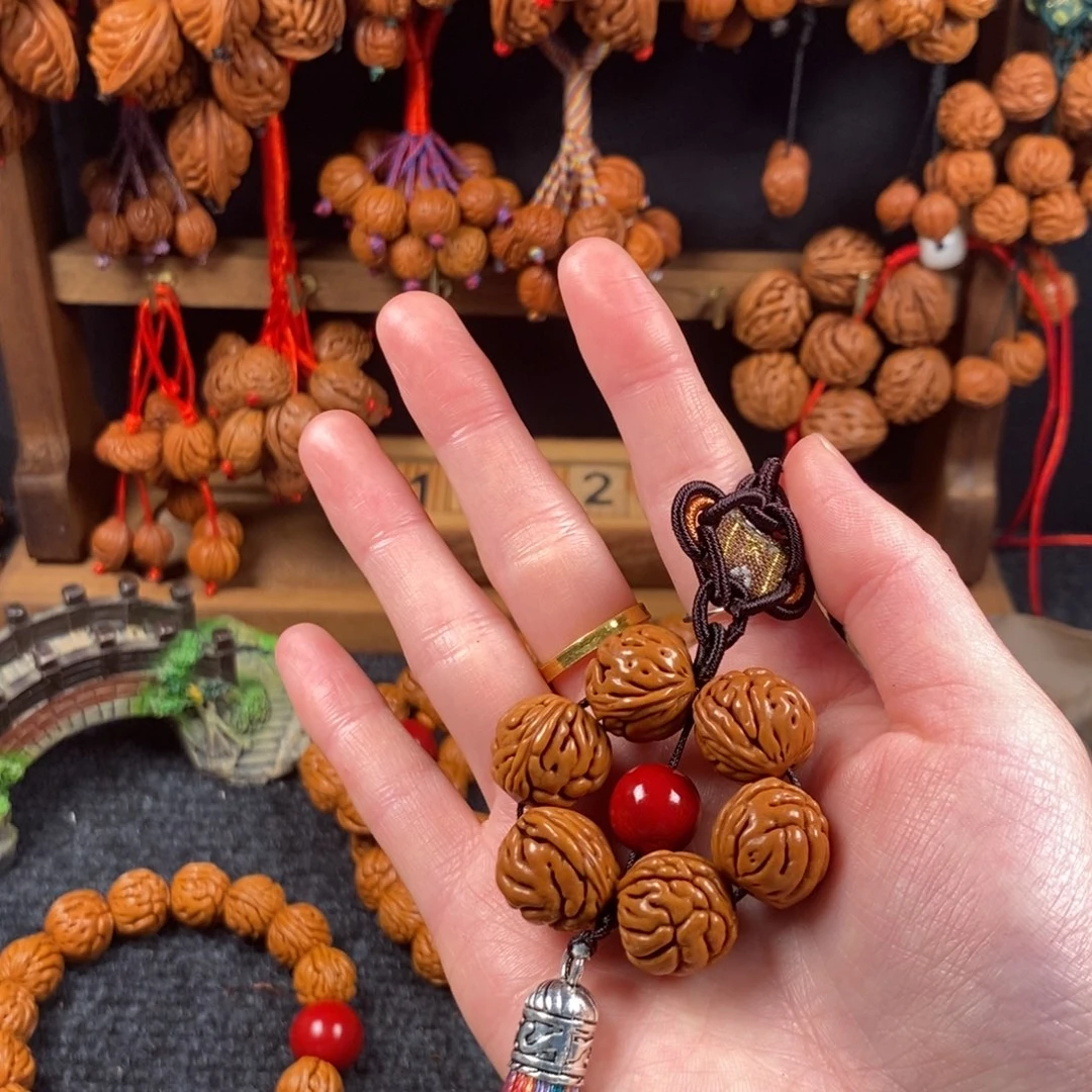 吊坠桃核桃枭手串