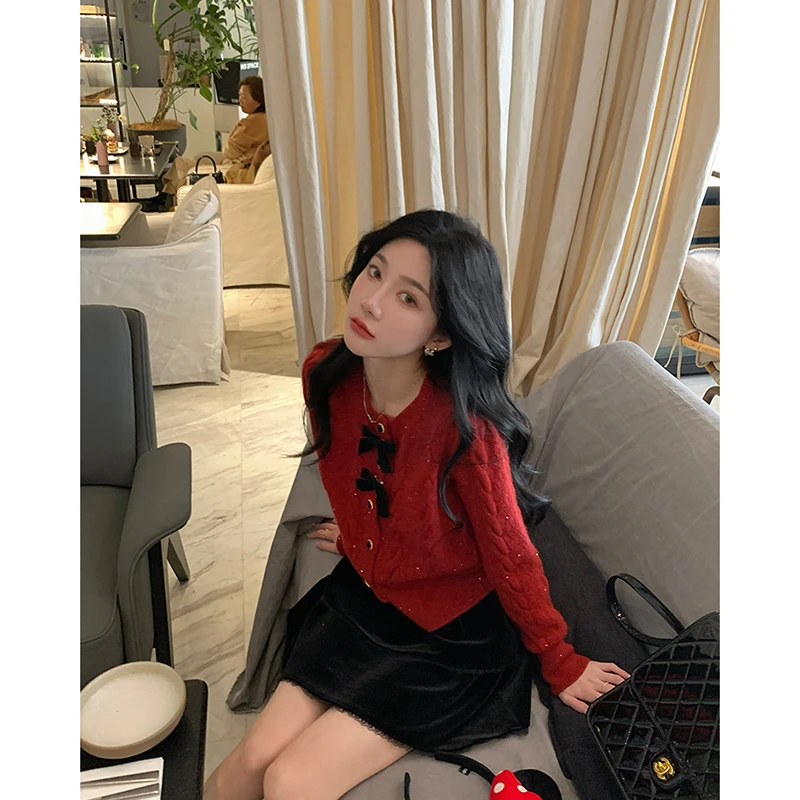 【大码】别致绝美红色圣诞毛衣女秋冬设计感蝴蝶结亮片针织开衫上衣
