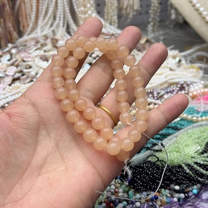 玛瑙/玉髓未镶嵌珠宝半成品一条8mm藕粉和田玉