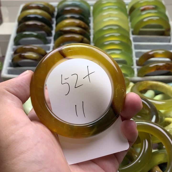 陈***芸未镶嵌蛇纹石玉手镯