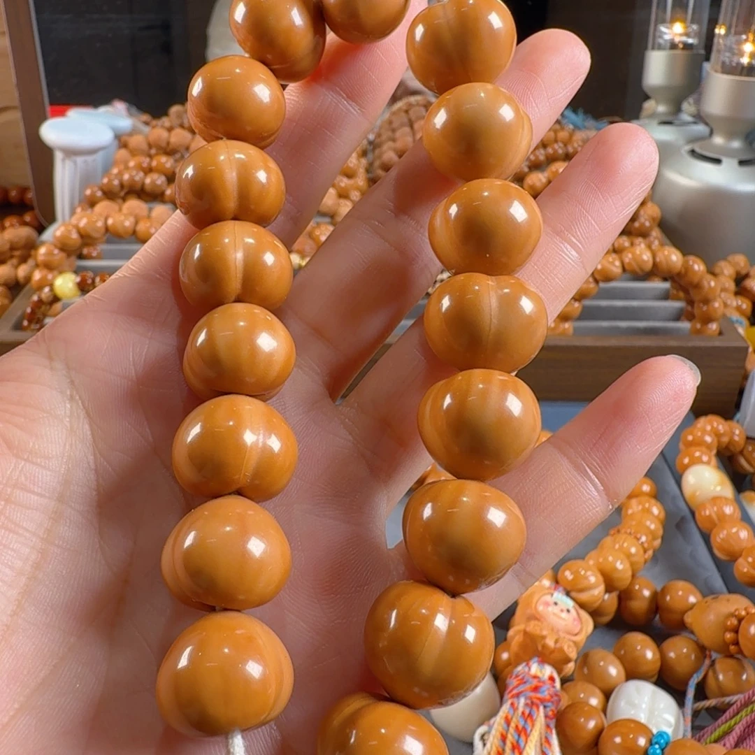 广***角猴头核桃吊坠光面屁桃19颗素串