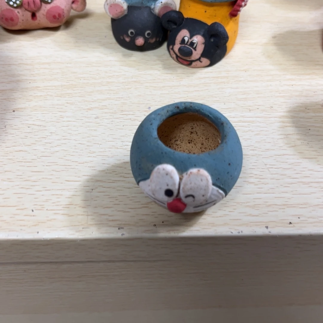 关***心泥塑古镇炻陶花盆