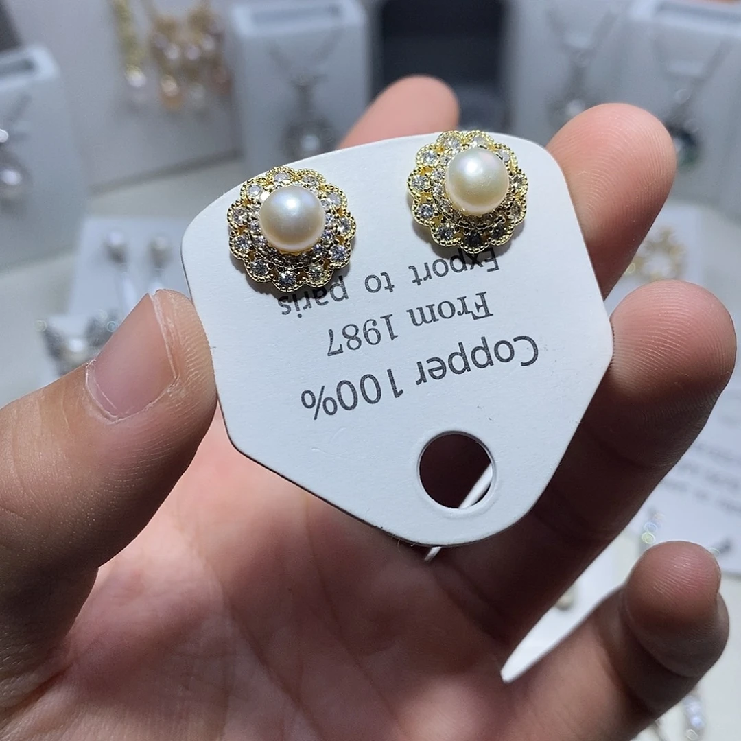 淡水珍珠银S925镶嵌耳饰