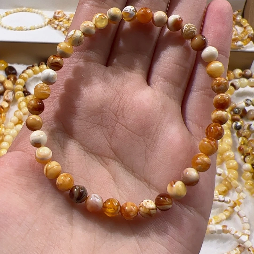 琥珀未镶嵌珠宝奇石橘沁妖花圆珠手串卡五加