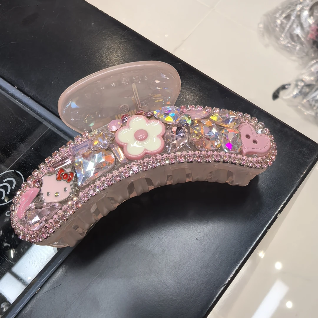 E020粉色花花KT猫咪闪闪抓夹