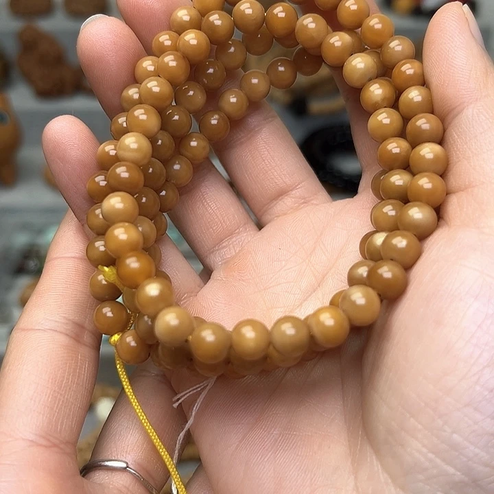 菩提根/象牙果吊坠诛*7.8m m龙脊老料玉化圆珠