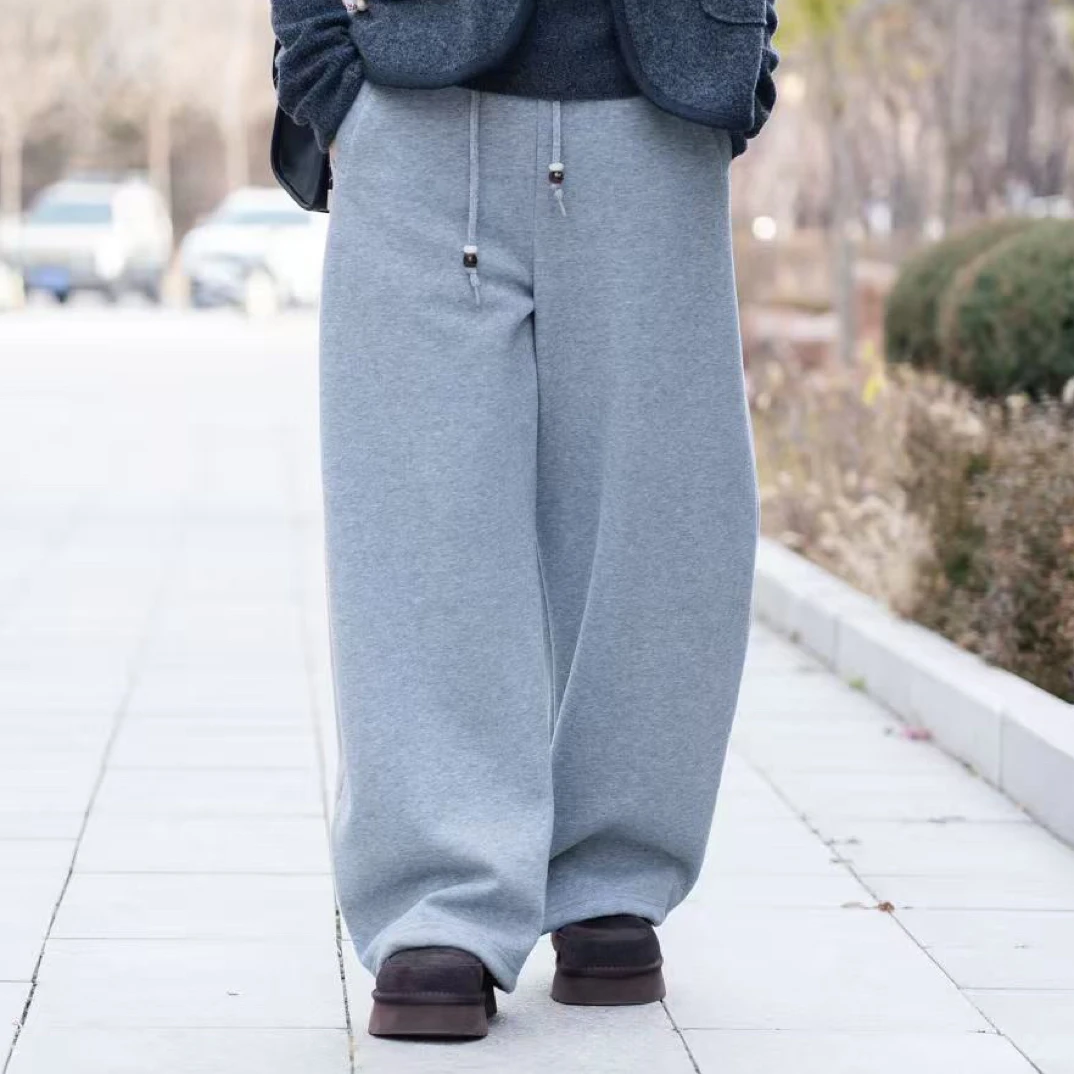 2521677【燕子优选】菲玛秀百搭时尚舒适加绒弯刀卫裤