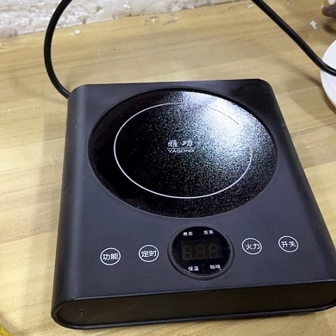 微瑕，不能明火，口径9厘米黑色，功率800瓦