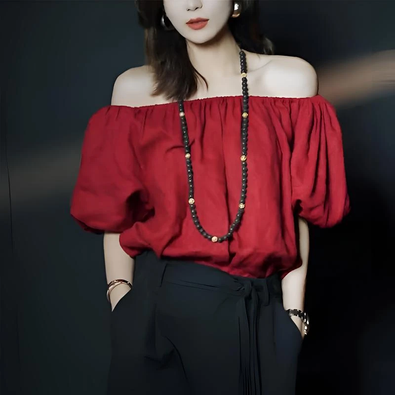 今年流行漂亮小衫港风复古别致高级感休闲红色泡泡袖一字肩衬衫夏