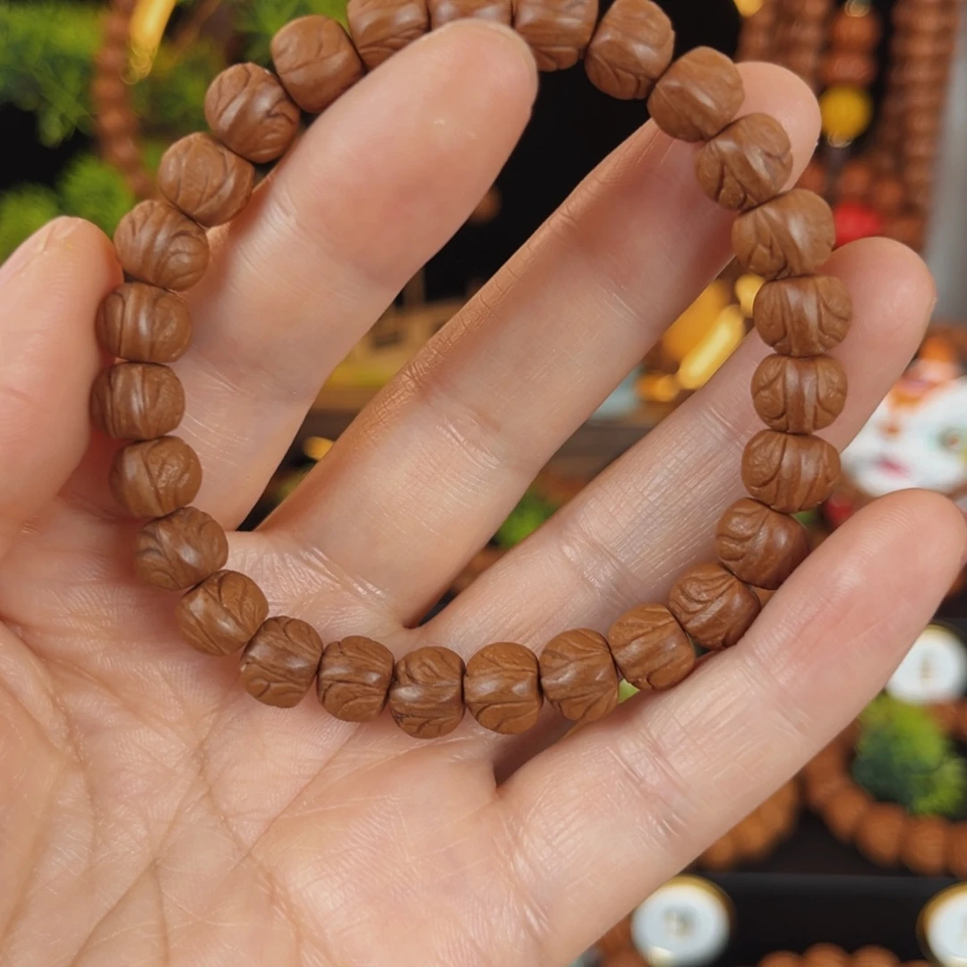 曾***琴手串桃核秦岭野生桃核手串