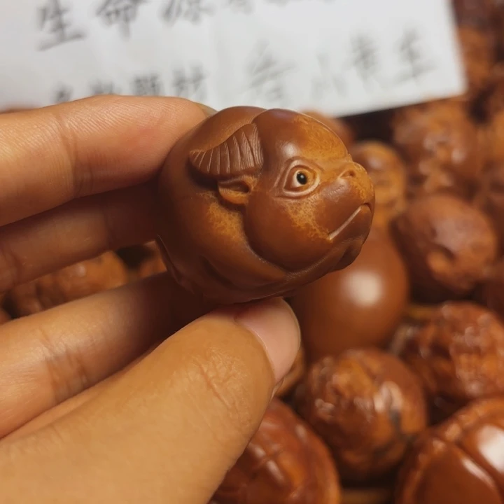 橄榄核把件牛 b 小母牛