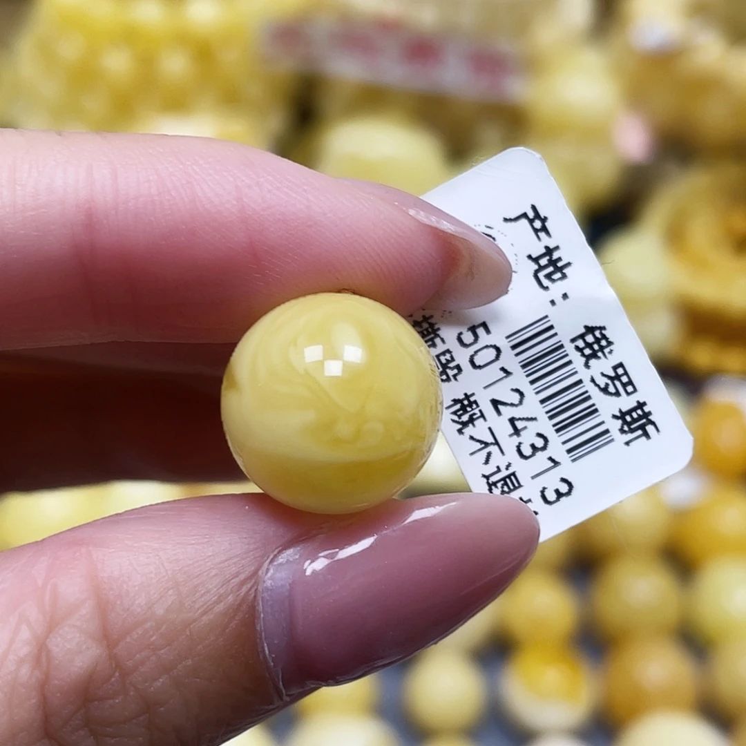 蜜蜡未镶嵌裸石14.2mm瑕疵