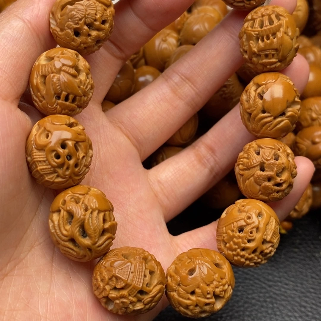 橄榄核手串镂空山水