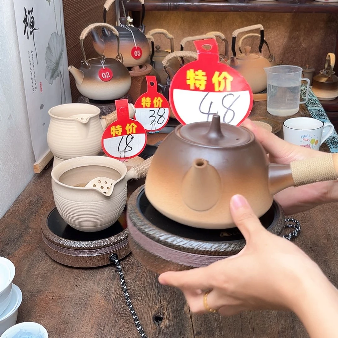 茶壶加电陶炉一套。。。。。。