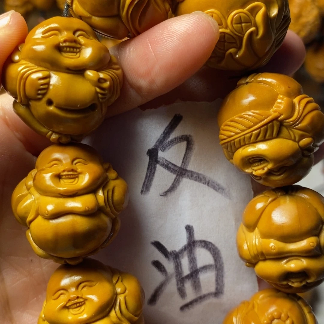 陈***鹅手串/手链橄榄核上色弥勒精品