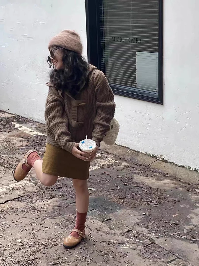 卷毛桃好看的羊角扣外套(120.130码)