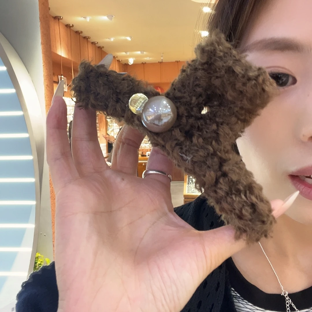 布艺非金属深咖色毛毛抓