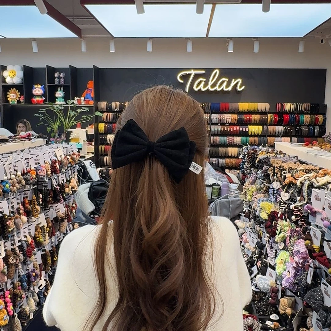 布艺非金属黑色蝴蝶结香蕉夹