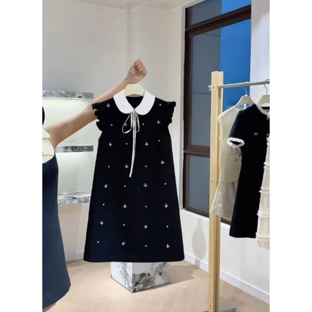 【南油一哥】甜心小飞袖时尚娃娃领黑色连衣裙2025夏季新款短裙女