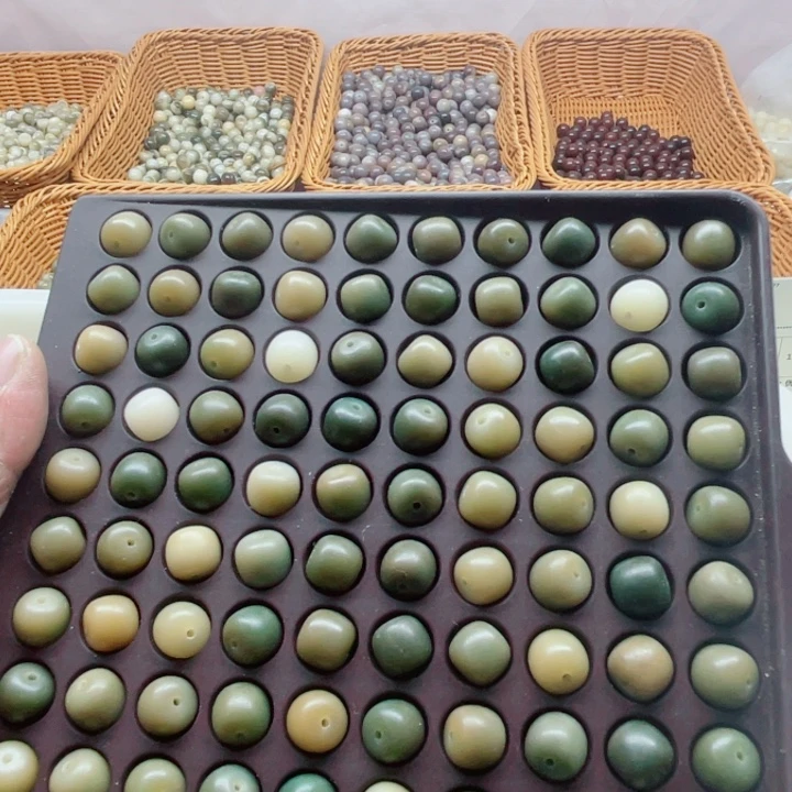 白玉菩提吊坠11-10阴皮桶珠120颗