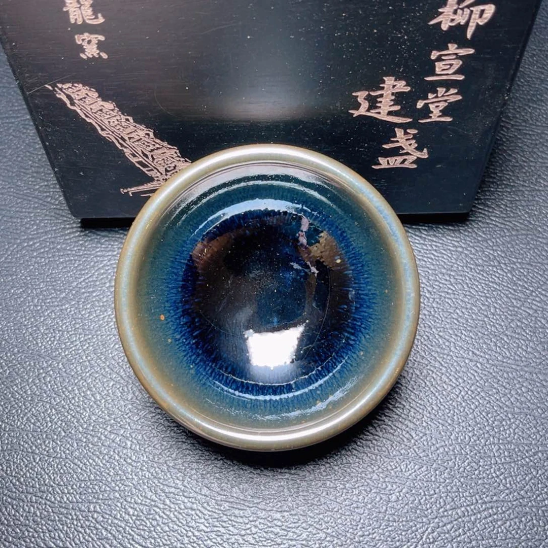 茶盏滴滴答答的声音响