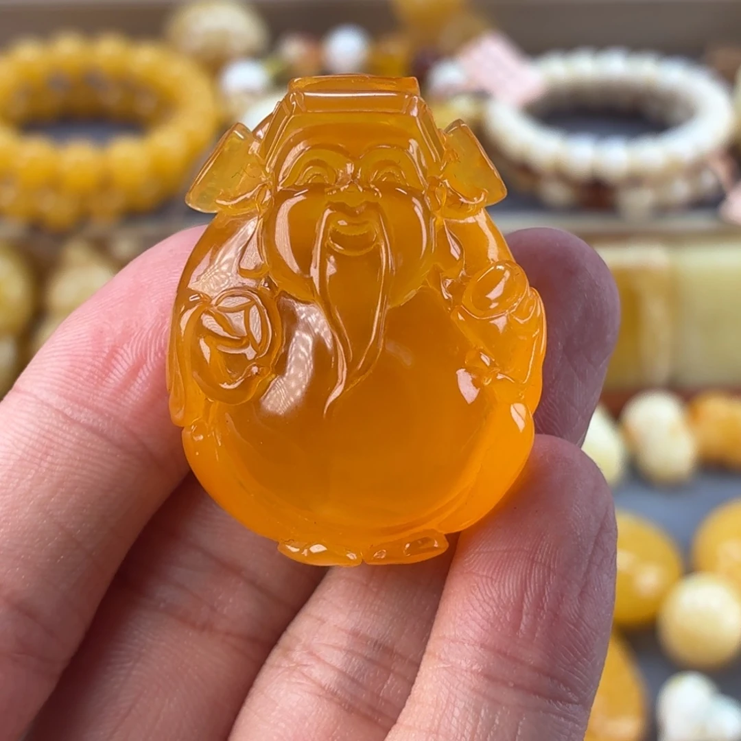 裸石琥珀未镶嵌财神爷
