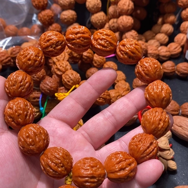 赵***—核桃核桃荔枝纹手串