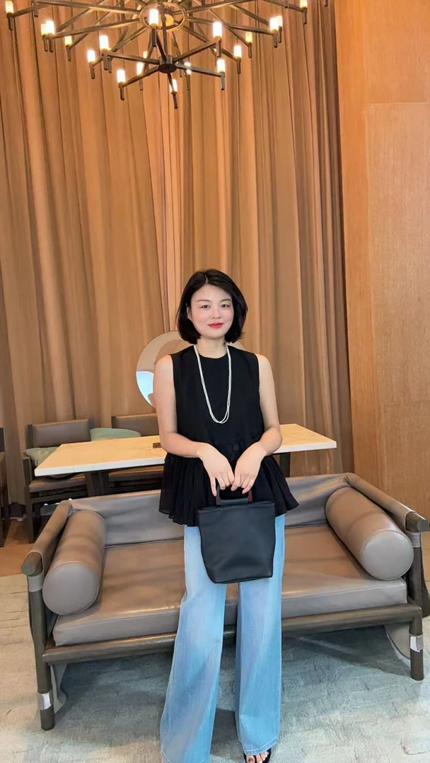 TANTAN  气质时尚下摆裙边无袖背心1650