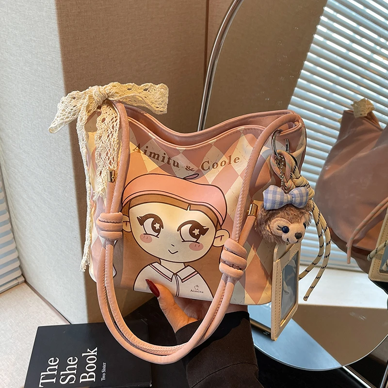 艾米兔女包2025新款可爱图案时尚百搭日常单肩斜挎水桶包