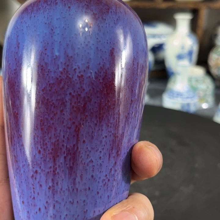 抖***乐摆件一个红色的小瓶子