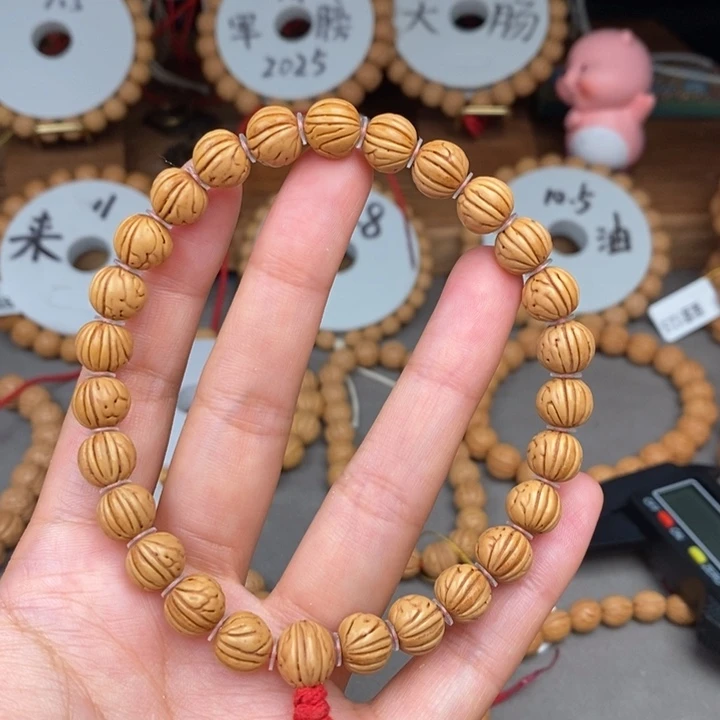 Y***生桃核手串9尺寸误差0.5Mm之间三道筋