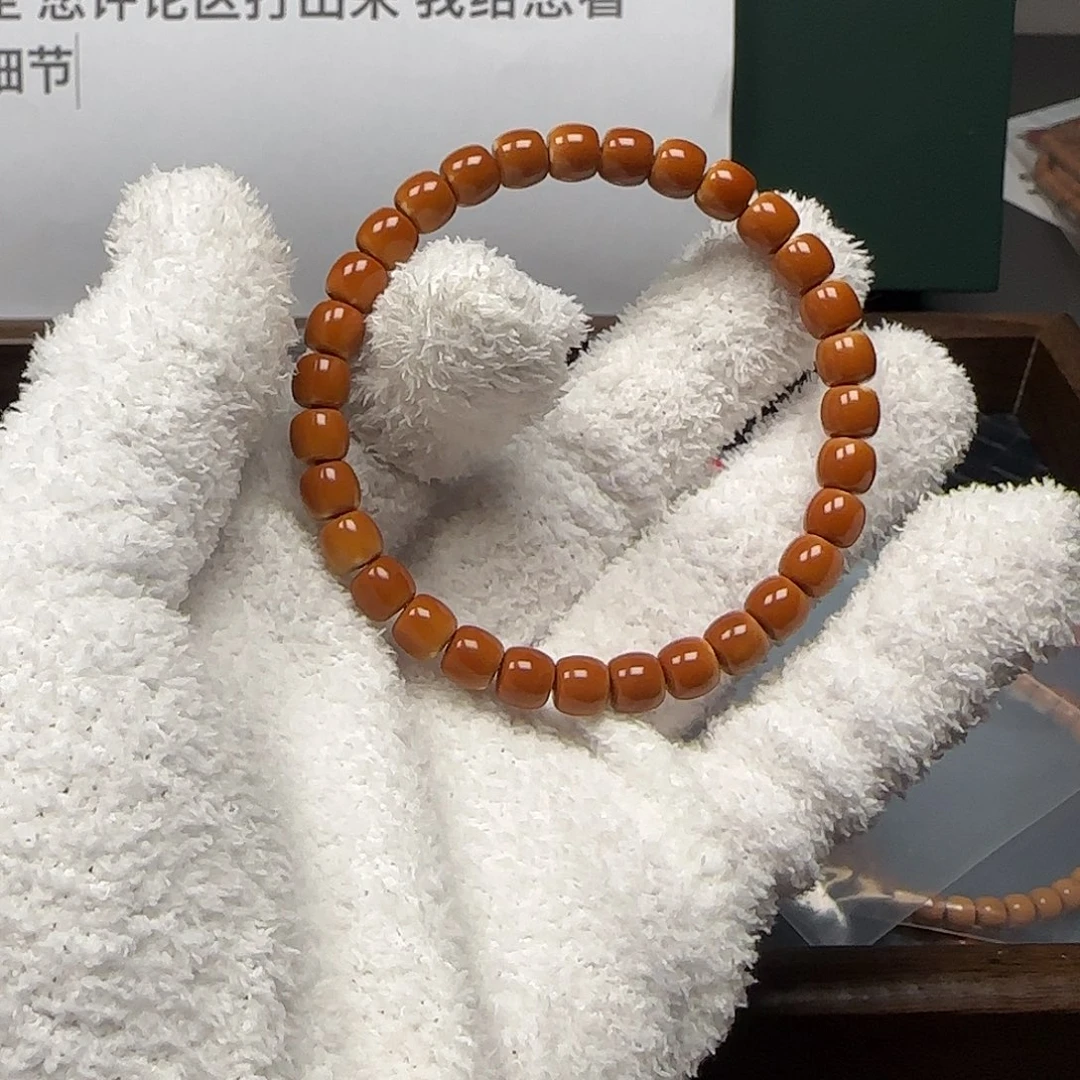 茶***派手串/手链橄榄核7.5mm老挝正三花核尖手串