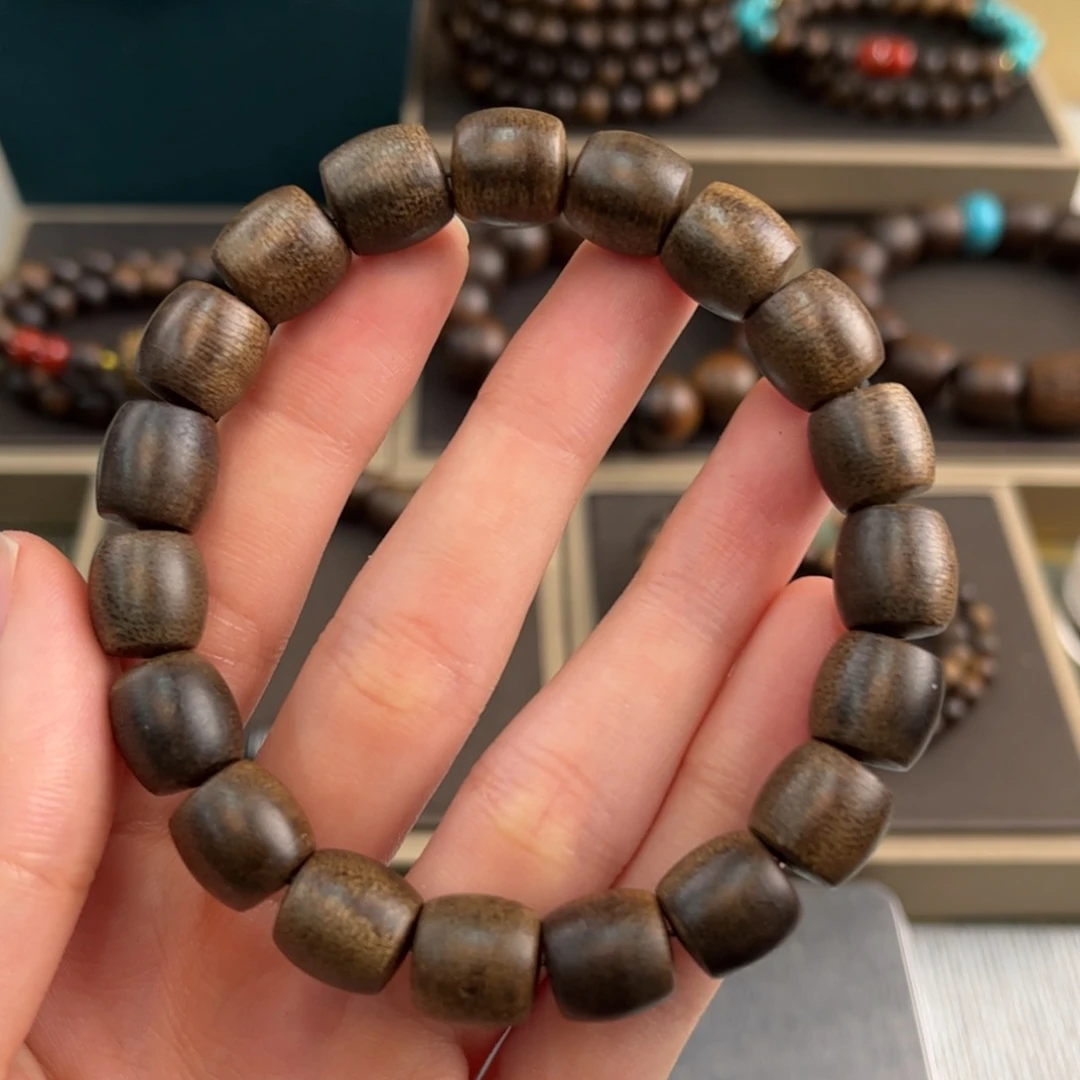 沉香碎屑沉香10mm桶珠海南莺歌绿奇楠沉水